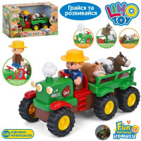 Розвивальна іграшка музичний Трактор M 6303