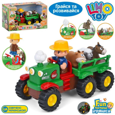 Розвивальна іграшка музичний Трактор M 6303